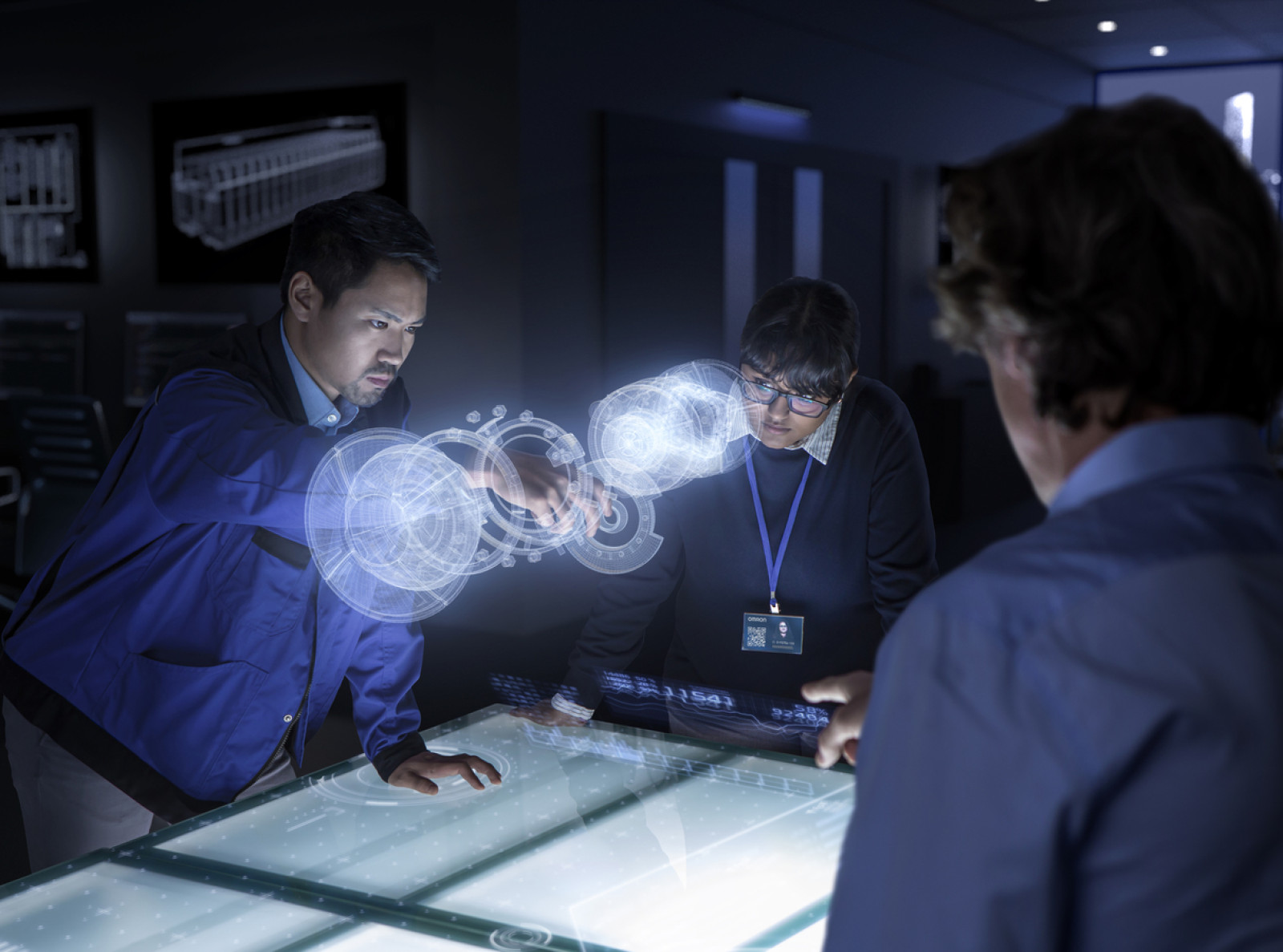 OMRON Engineers working in office