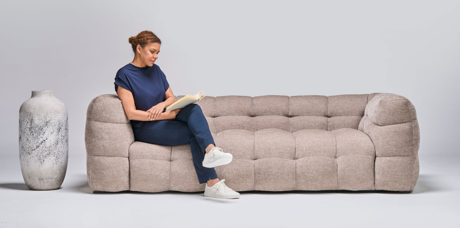 Woman reading on couch