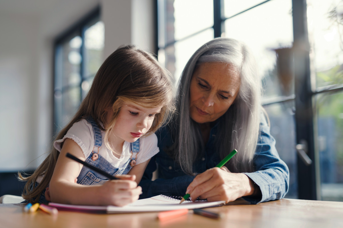 Grandmother and Granddaughter Making a Drawing Together